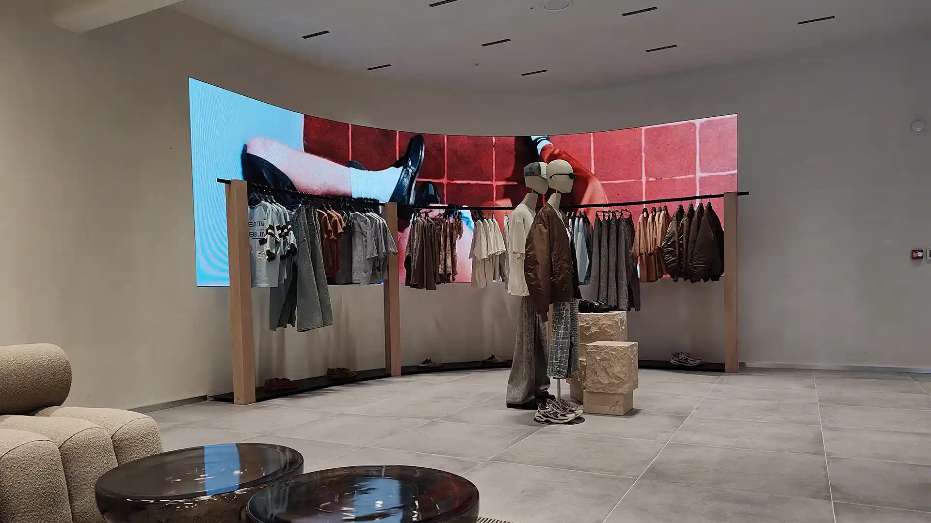 Interior view of Pull&Bear Oxford Street flagship showcasing immersive audiovisual integration.