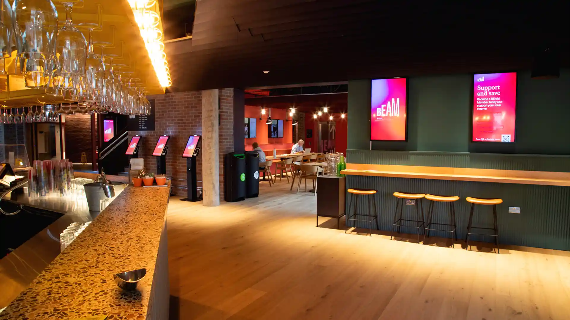 Exterior view of BEAM Theatre’s refurbished entrance with integrated LED digital signage.