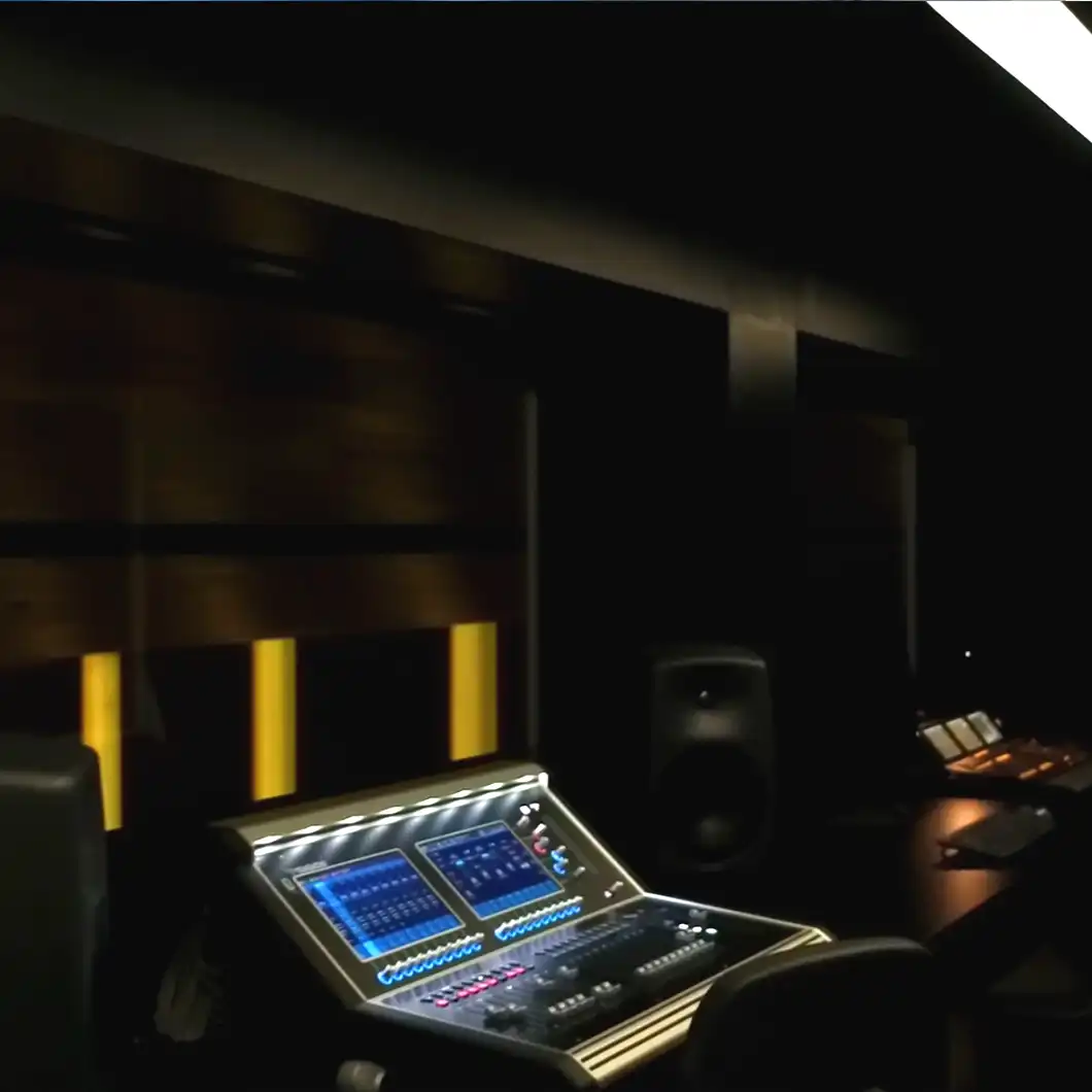 Consulting lounge with meeting setup, digital screens, and comfortable seating.