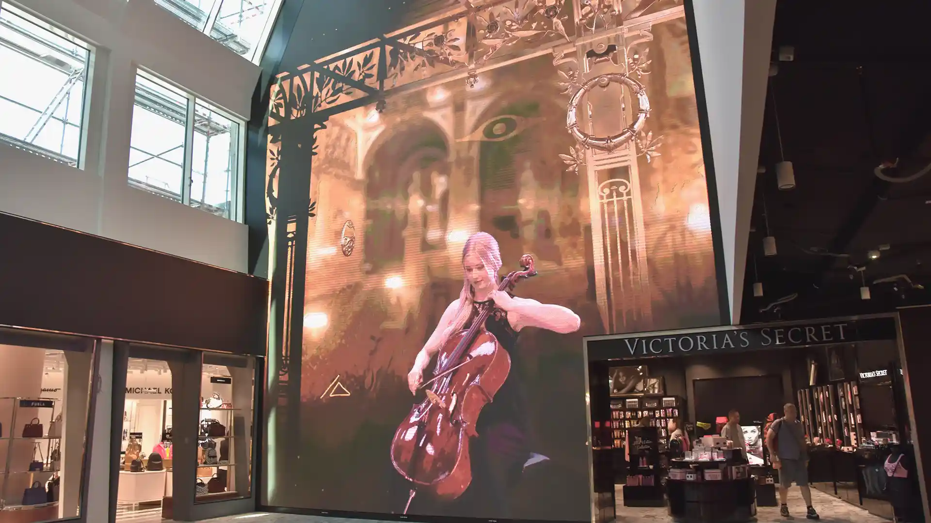 Seamless architectural integration of a large-scale LED installation at Vienna Airport.