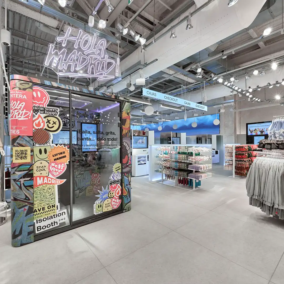 LED ring signage guiding customers through categories inside Lefties Digital Store.