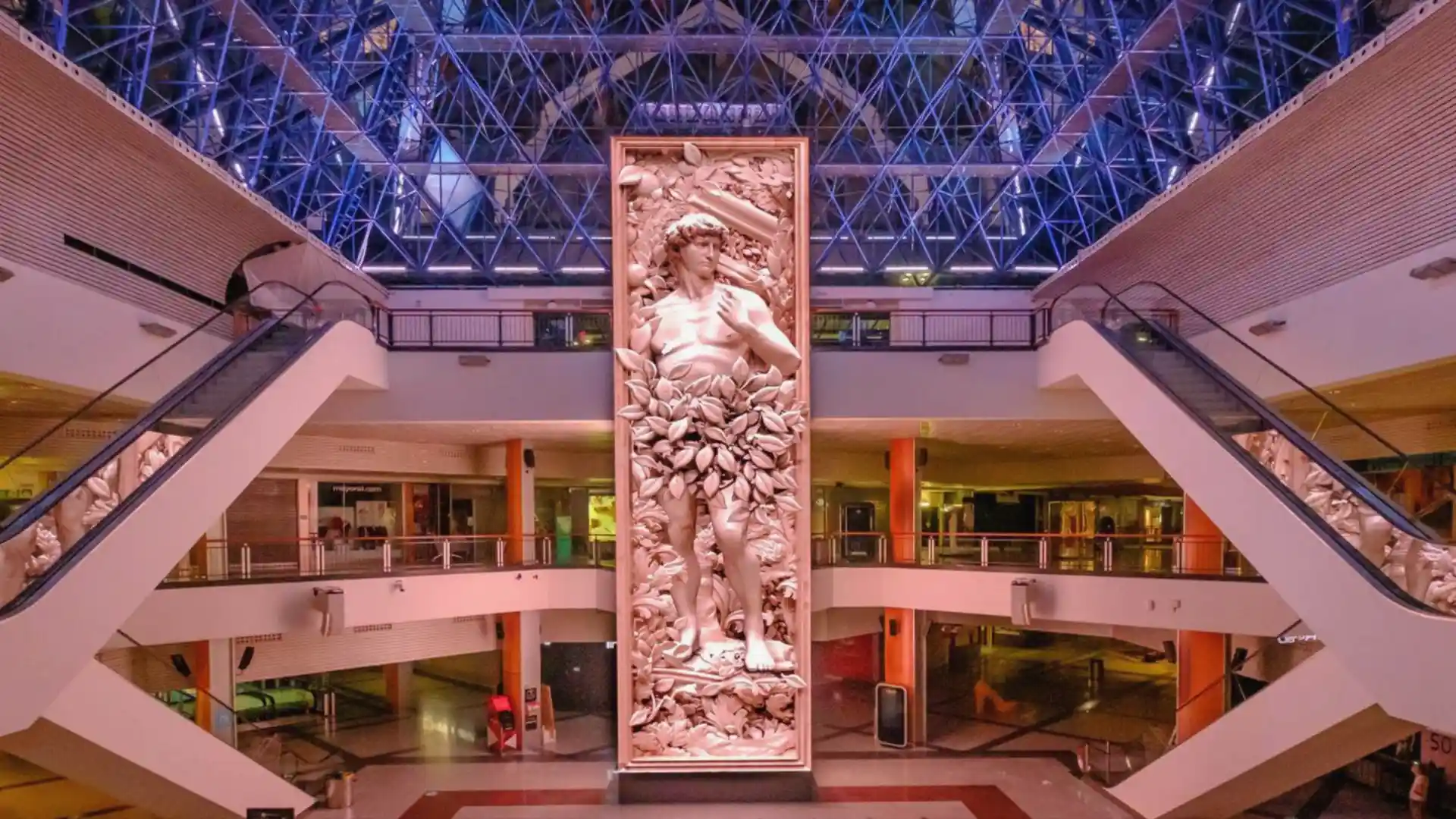 Visitors interacting with 3D digital art and augmented reality experiences at Max Center