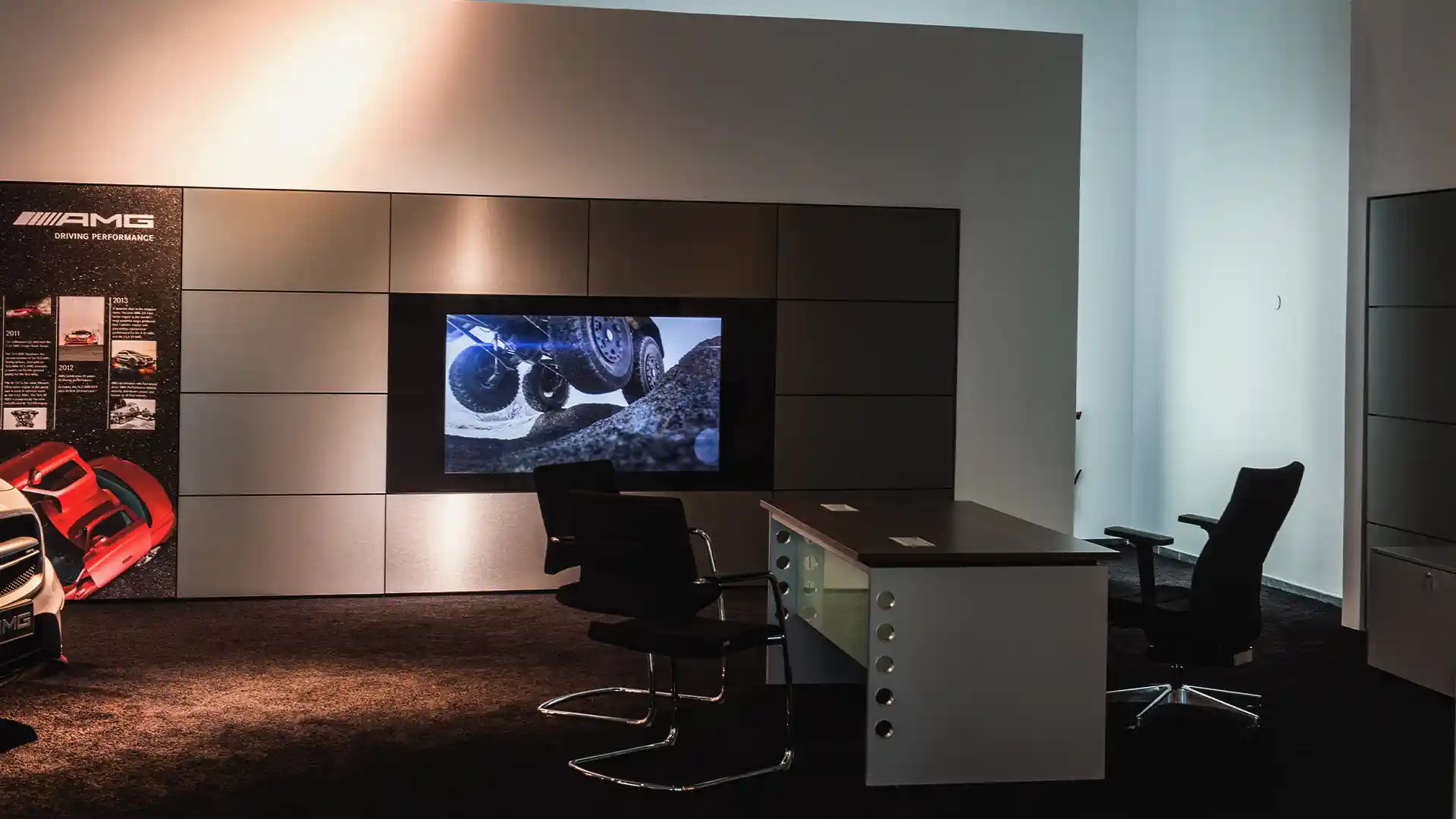 After-sales area with digital signage supporting customer guidance and service messaging in Mercedes-Benz dealership.