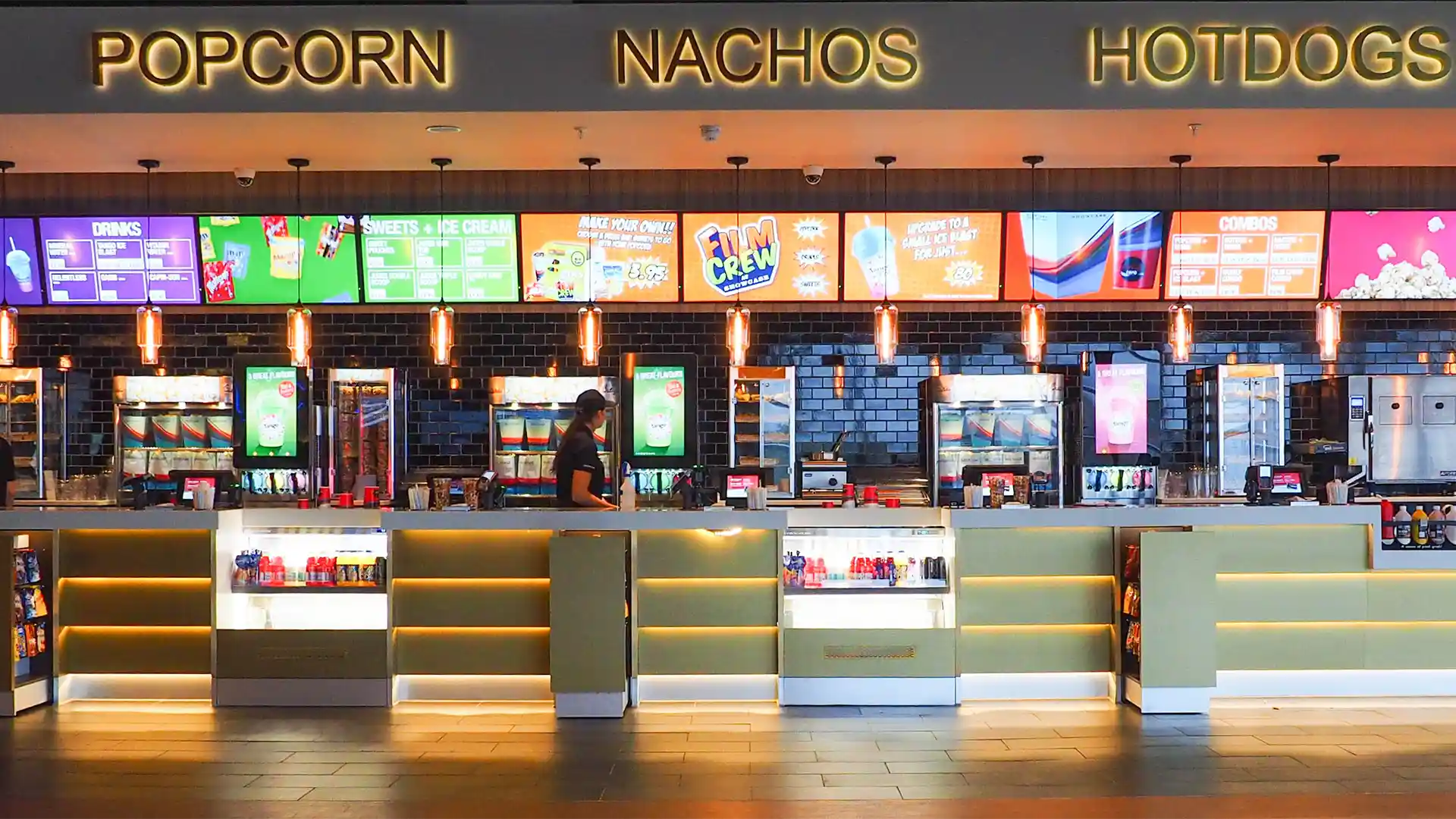 Suspended 40-screen curved video wall in the lobby of Showcase Cinema de Lux Southampton, creating a striking digital entrance experience.