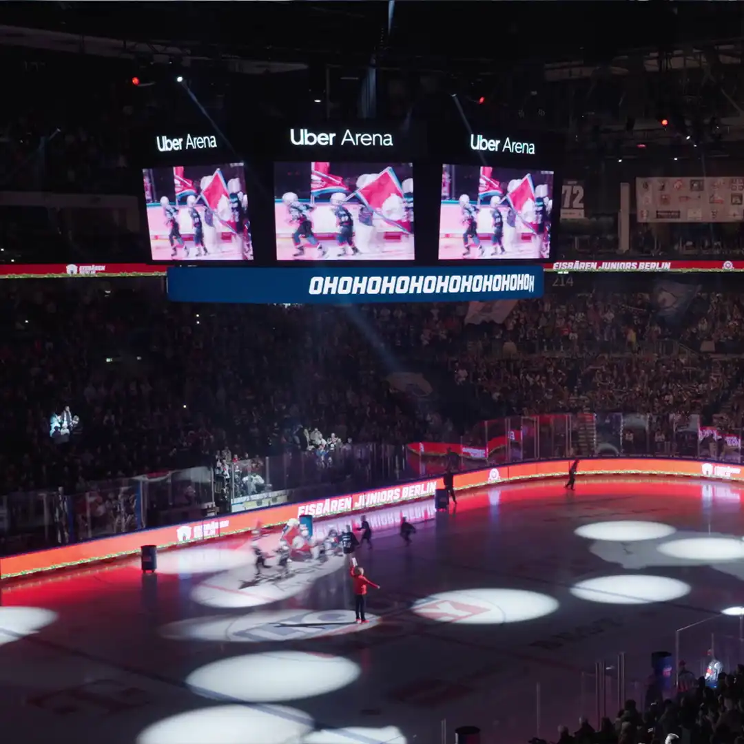 AEG staff operating real-time LED content system during a concert at Uber Arena.