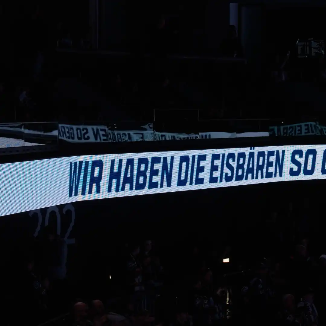 TRISON technical team managing LED setup with cranes and safety gear at Uber Arena.